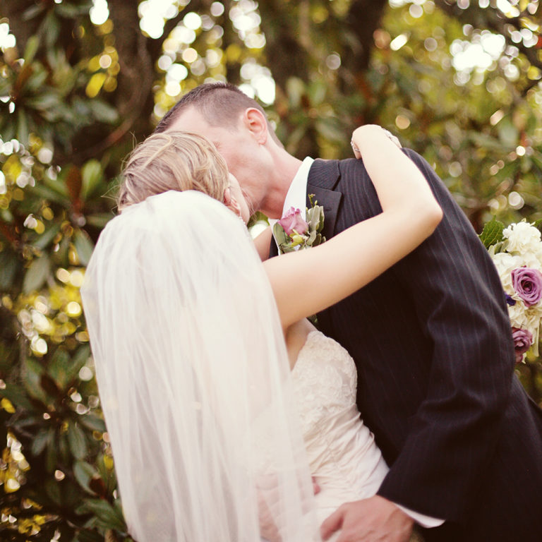 wedding photography of a flower girl smiling