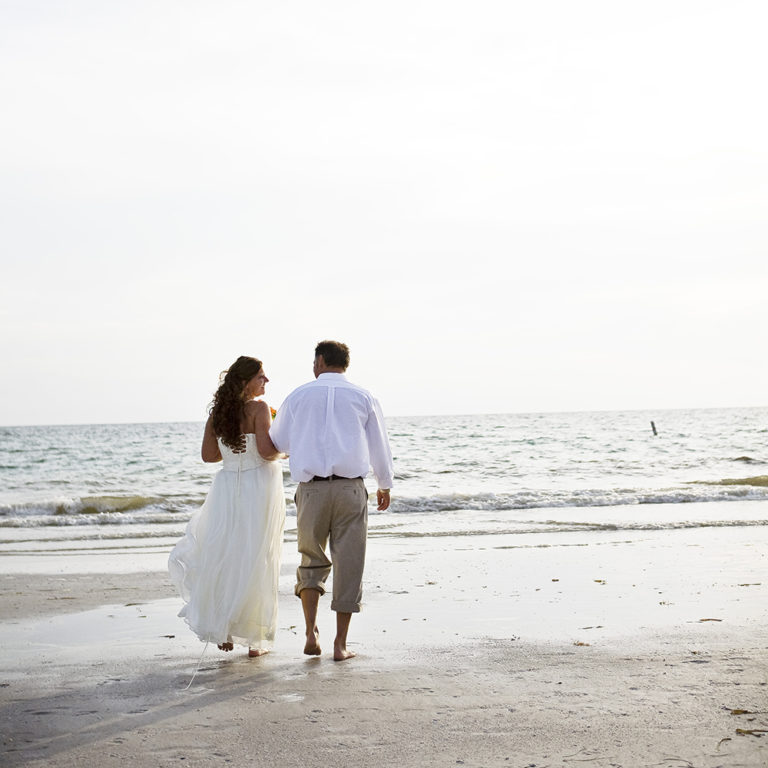 wedding photography of a flower girl smiling