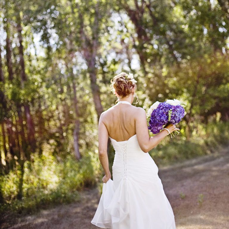 wedding photography of a flower girl smiling