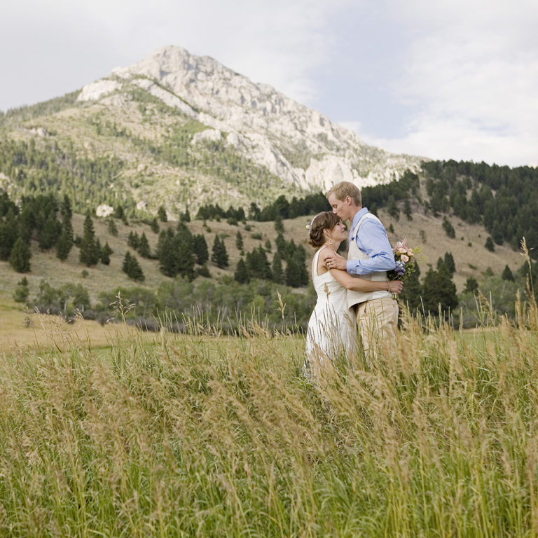 wedding photography of a flower girl smiling