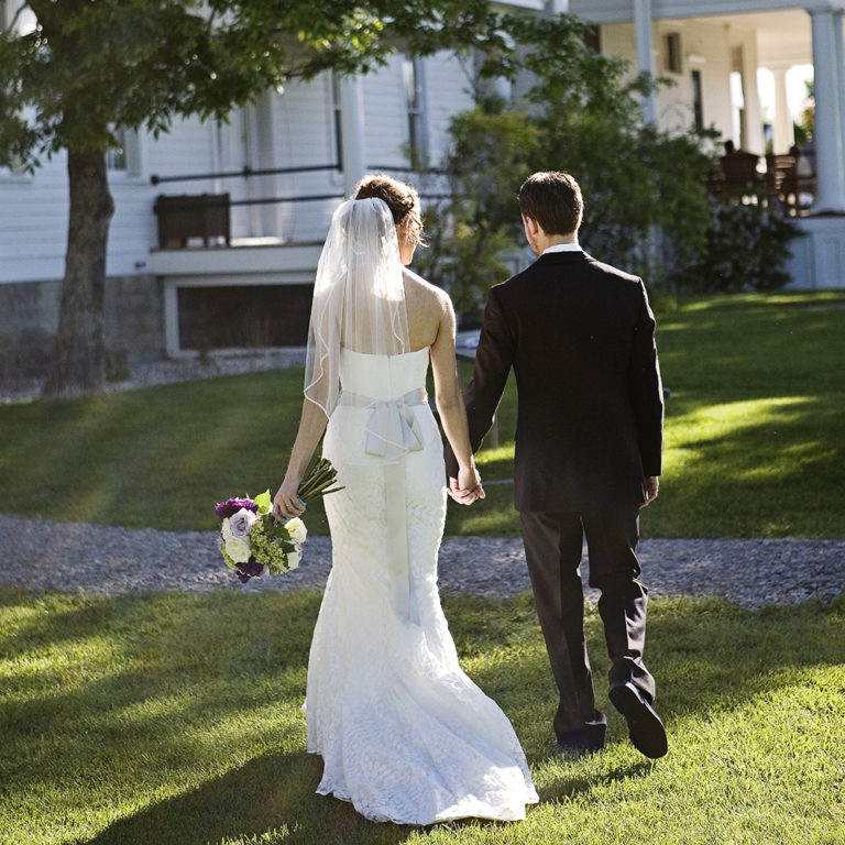 wedding photography of a flower girl smiling