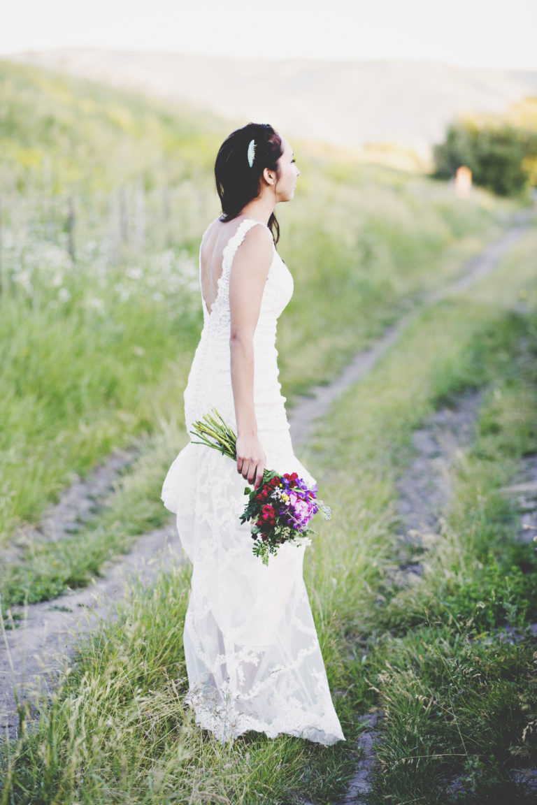 wedding photography of a flower girl smiling