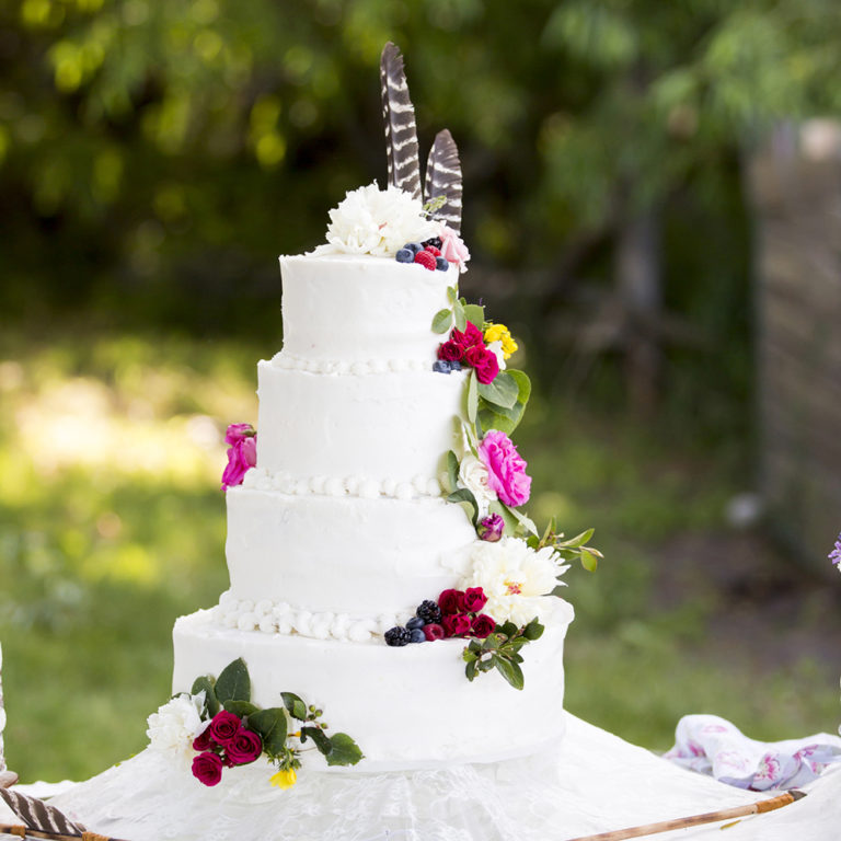 wedding photography of a flower girl smiling