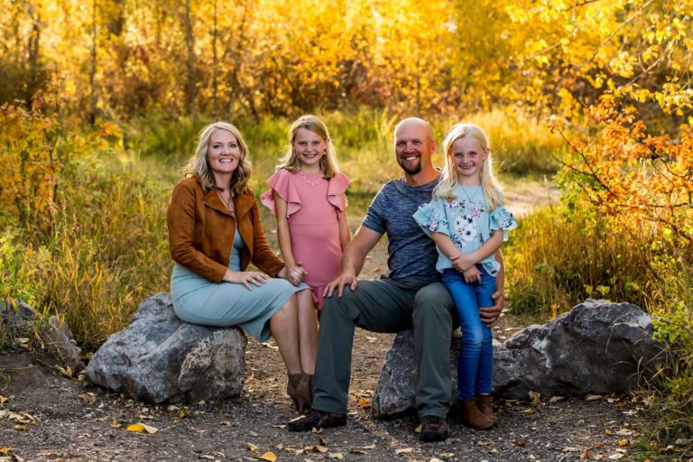 family portrait of a family of four at the Cameron Bridge fishing access