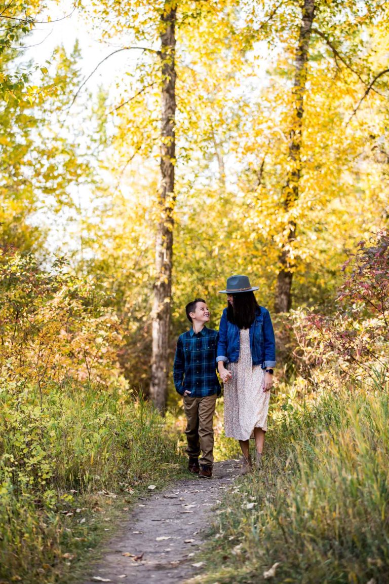 mother and son looking at each other while strolling the path at the Cameron Bridge fishing access